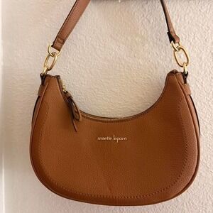 Tan Nanette Lepore Shoulder Bag *slight indentation on front of bag*